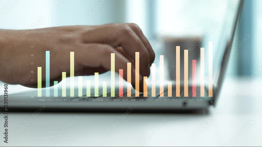 Poster business hand typing on laptop keyboard with colorful financial bar graph overlay.