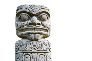 Large stone statue of a man with a frowning face