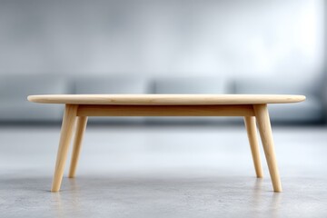 A stylish wooden coffee table in a modern and minimalist living room.