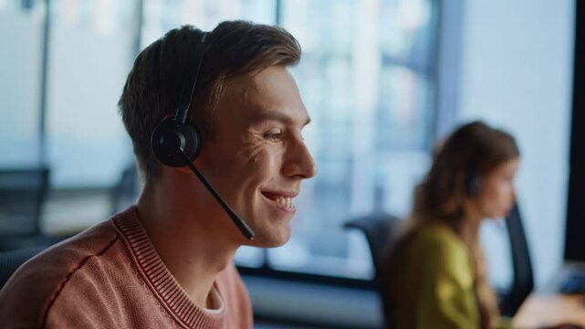 Closeup technical assistant talking in call center. Man resolve request online