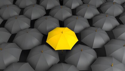 Yellow umbrella stands out among grey.