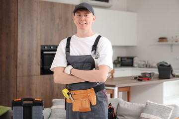 Portrait of male technician in kitchen