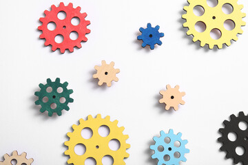 Wooden gears on white background