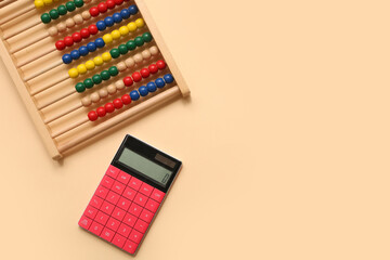 Wooden abacus and calculator on beige background. Concept of evolution
