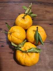 Citrus fruits on a wooden table
