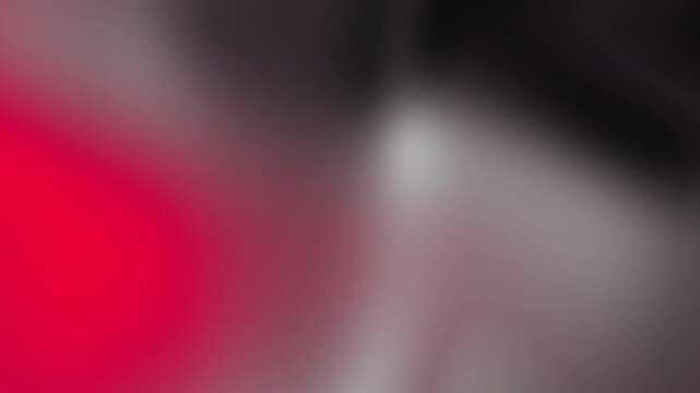 Abstract gradient background featuring a blend of deep red and black tones with a subtle gray highlight, ideal for creative designs
