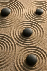 Naklejka premium Tranquil Zen Garden with Smooth Stones and Serene Sand Patterns Evoking Calmness and Reflection for Your Peaceful Retreats and Mindful Spaces