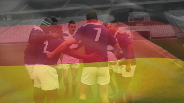 Eight rugby players entering pitch holding ball and forming huddle while exchanging rallying calls