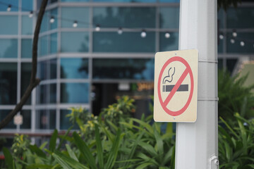 No smoking sign displayed in front of modern building