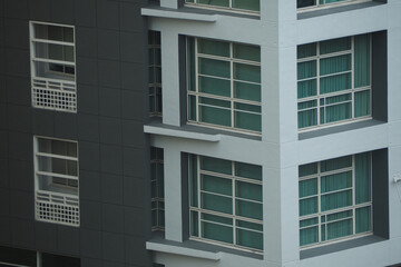 Modern apartment building with large windows and clean lines