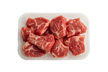 Raw beef pieces in plastic try isolated on transparent background.