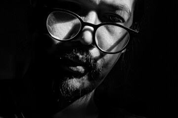 Portrait of a Man in Darkness Reflecting Mental Health Struggles