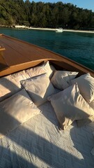 relaxing boat on the lake with white pillow