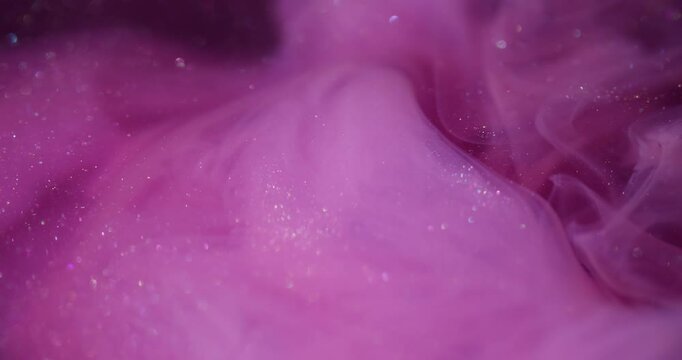 Mist blow. Dye spread. Smoke paint cloud underwater explosion. Fantasy dissolve pink purple color pigment floating defocused stream background.