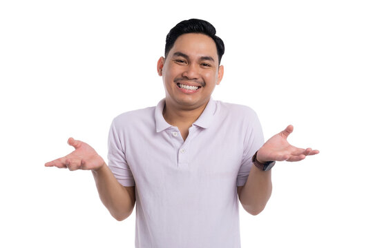 Confused young Asian man shrugging shoulders and smiling uncertainly isolated on transparent background - Powered by Adobe