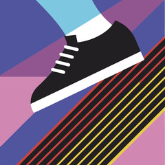 Close up of a black and white shoe on colorful stripes