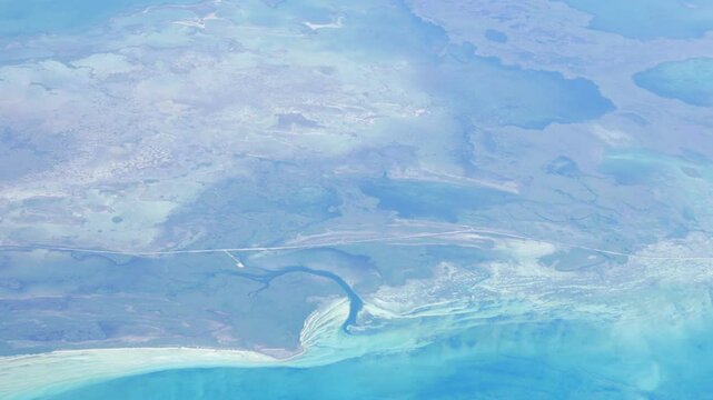 Aerial shot from a commercial airline over Cuba. Over the northern coastal resort are of Cayo Coco.