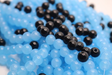 close up view of black and black beads