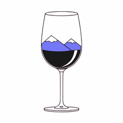 Wine glass filled with mountains and dark liquid inside