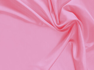 Pastel pale light rose salmon flamingo watermelon bubble gum candy floss baby pink. Cotton silk satin drape. Luxurious fabric ,empty copy space for text. Gentle twisted folds, curve, curl of drape.