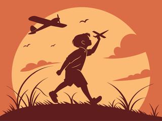 Silhouette of a boy playing with a toy airplane in the sunset