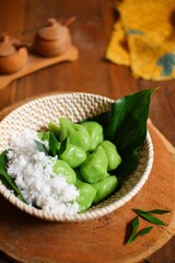 Glutinous rice balls with coconut grated or klepon in a bowl 