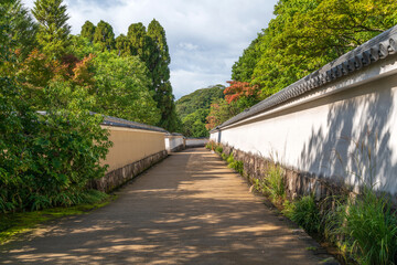 Passage between themed areas in the Koko-en Garden on a sunny autumn day, Himeji, Hyogo Prefecture, Japan