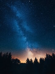 Starry Night Sky with Milky Way Over Forest Silhouette