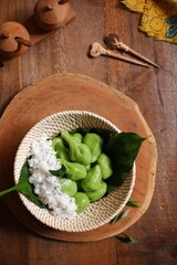 Glutinous rice balls with coconut grated or klepon in a bowl