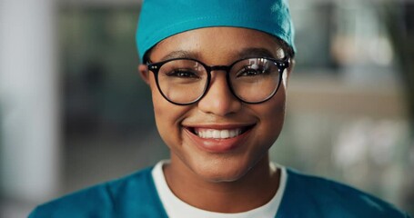 Face mask, surgeon and woman with smile in hospital for healthcare, wellness and safety. Portrait, doctor and medical professional with ppe, scrubs and surgery employee for support, help and glasses - Powered by Adobe