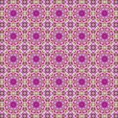 Floral kaleidoscope of magenta and cream blossoms in a geometric arrangement seamless pattern