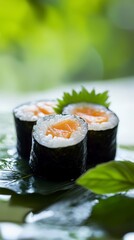 Fresh Sushi Rolls with Salmon and Green Garnish on Leafy Background