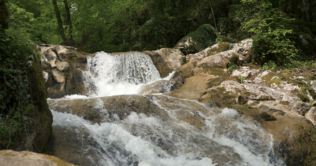A magical stream with waterfalls and rapids.