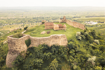 Aerial view Manavi Fortress Complex. A Medieval Royal Stronghold. Strategic Hilltop Citadel Overlooking Iori Valley in Kakheti, Georgia. Hidden gem sightseeing off the beaten path attraction