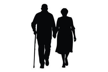 Silhouette of elderly couple walking hand in hand