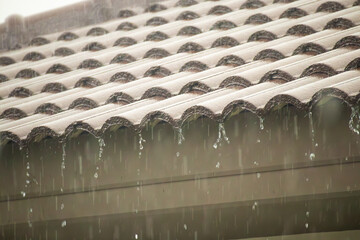 rain falling down from the house roof