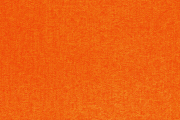 Fototapeta premium Orange cotton fabric texture background, seamless pattern of natural textile.