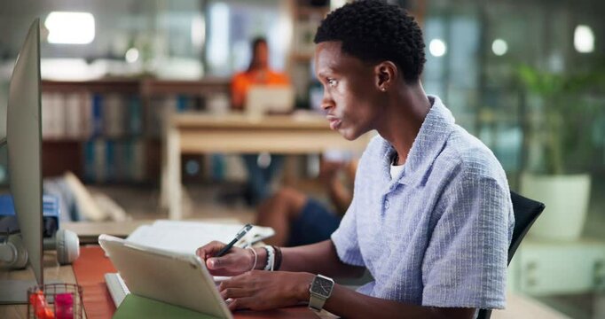 Business, writing and man in office, computer and planning for project, creativity and ideas. Person, web designer and employee in workplace, pc and paperwork with report for proposal and internet