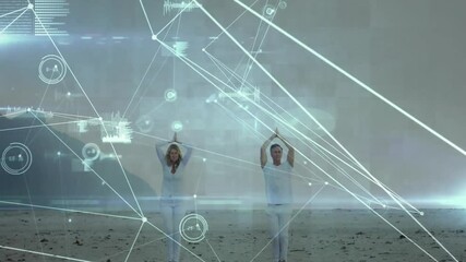 digital overlay pulsing sparking couple on beach holding yoga prayer pose monitoring health data - Powered by Adobe