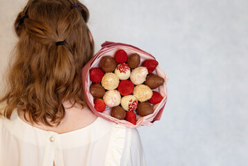 Delightful chocolate and strawberry bouquet crafted for a special occasion in a charming indoor setting