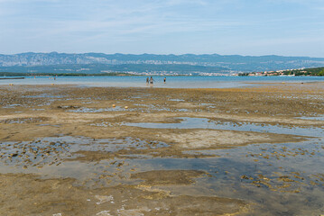 Healing Mud Pools in Soline Bay, Krk Island, Croatia &mdash; Wellness, Nature, Alternative Therapy Concept