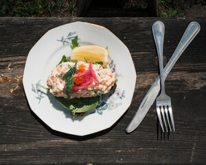 traditional Swedish open prawn sandwich on rye bread on a table