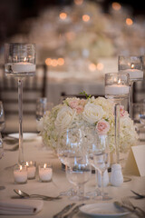 Elegant Candlelit Wedding Table with Floral Centerpiece