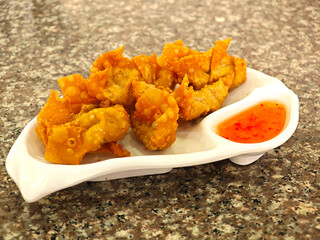 Fried Crispy Pork Wonton with Sweet Chili Sauce.