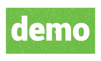 demo text written on green stamp sign.