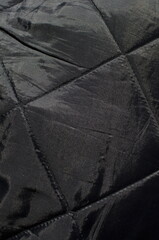 A black shiny lining background