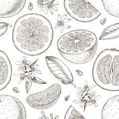 Seamless pattern with grapefruits, slices and flowers