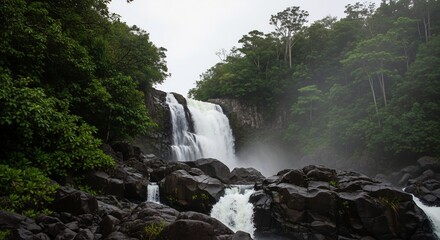 Magnificent Waterfall in Lush Rainforest Landscape: Tropical Paradise with Cascading Water