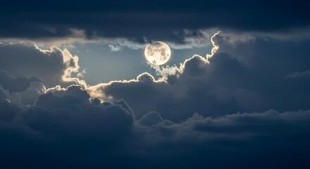 Full moon peeking through clouds