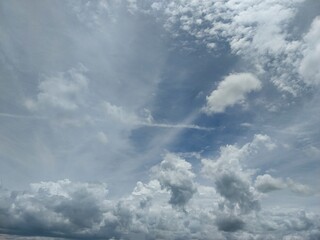 Blue Sky Framed With Puffy Clouds